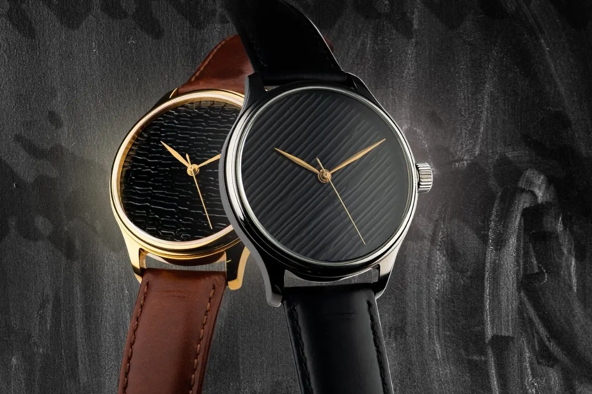 Wancher Dream Watch hero shot, black urushi dial angled under light