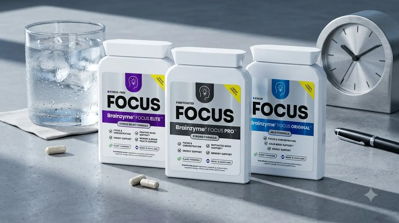 Brainzyme Focus Original, Pro, and Elite bottles lined up side by side on a desk