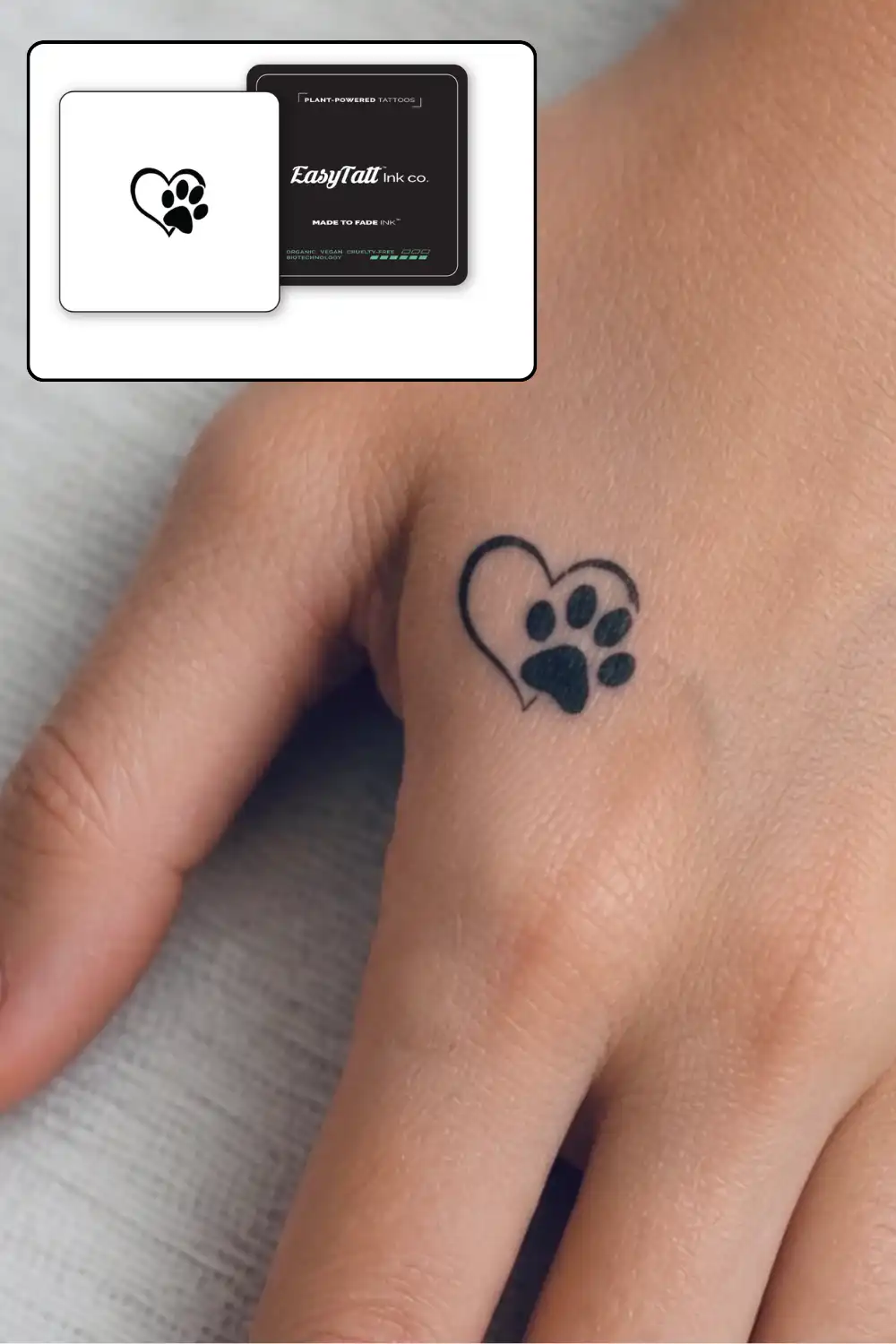 EasyTatt vs Inkbox wear example: small heart-shaped paw print tattoo on the back of a hand with EasyTatt Ink co. packaging inset in the corner