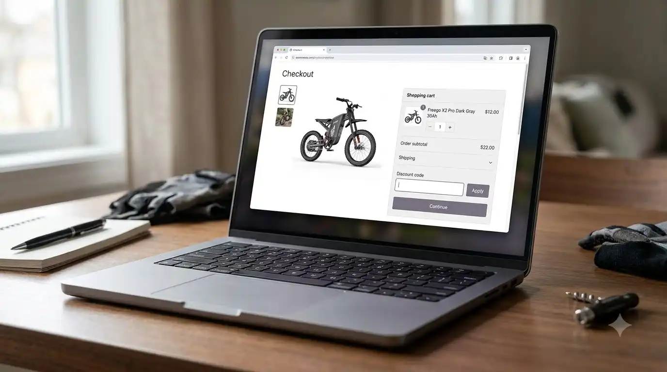 Screenshot of the Freego checkout page on a laptop showing the X2 Pro Dark Gray 30Ah in the cart and a discount code field